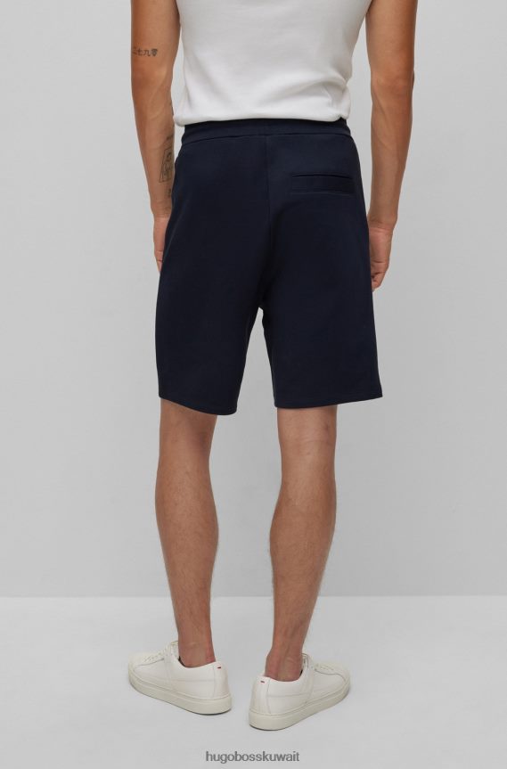 4TFNJN4134 أزرق غامق Hugo Boss شورت من قطن تيري مع تفاصيل الشعار باللون الأزرق الداكن