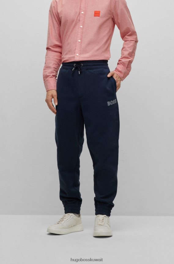 4TFNJN4147 أزرق غامق Hugo Boss بدلة رياضية من مزيج القطن باللون الأزرق الداكن مع شعار Hugo بلون متباين