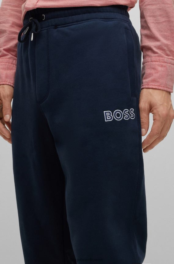 4TFNJN4147 أزرق غامق Hugo Boss بدلة رياضية من مزيج القطن باللون الأزرق الداكن مع شعار Hugo بلون متباين