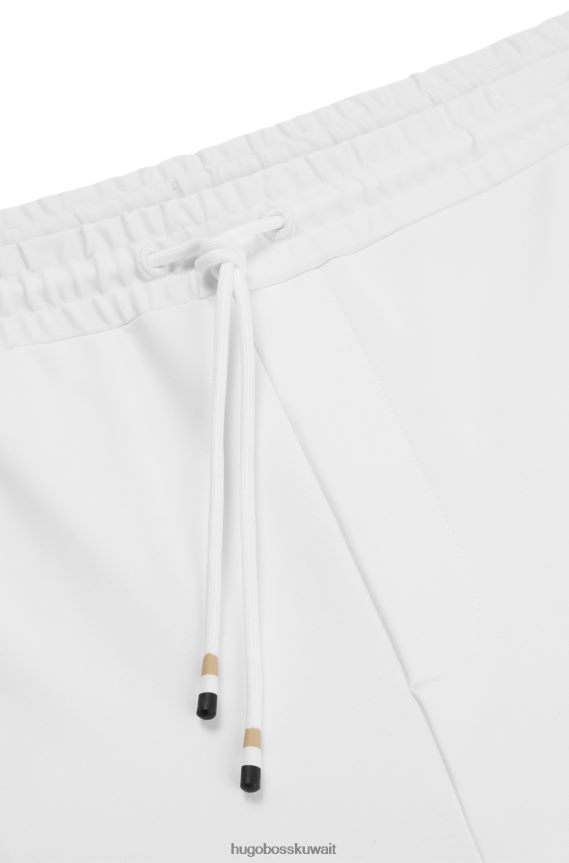 4TFNJN4167 أبيض Hugo Boss قطعة سفلية رياضية بيضاء من Hugo مصنوعة من قماش نشط ومطاط مع خطوط جانبية