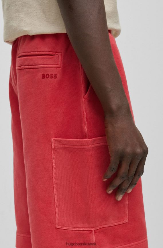4TFNJN4189 أحمر Hugo Boss شورت من قطن تيري المصبوغ مع جيوب هوغو باللون الأحمر