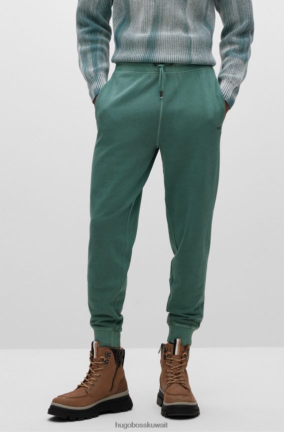 4TFNJN4216 أخضر Hugo Boss بنطال رياضي من Hugo باللون الأخضر المريح مصنوع من قطن تيري الفرنسي
