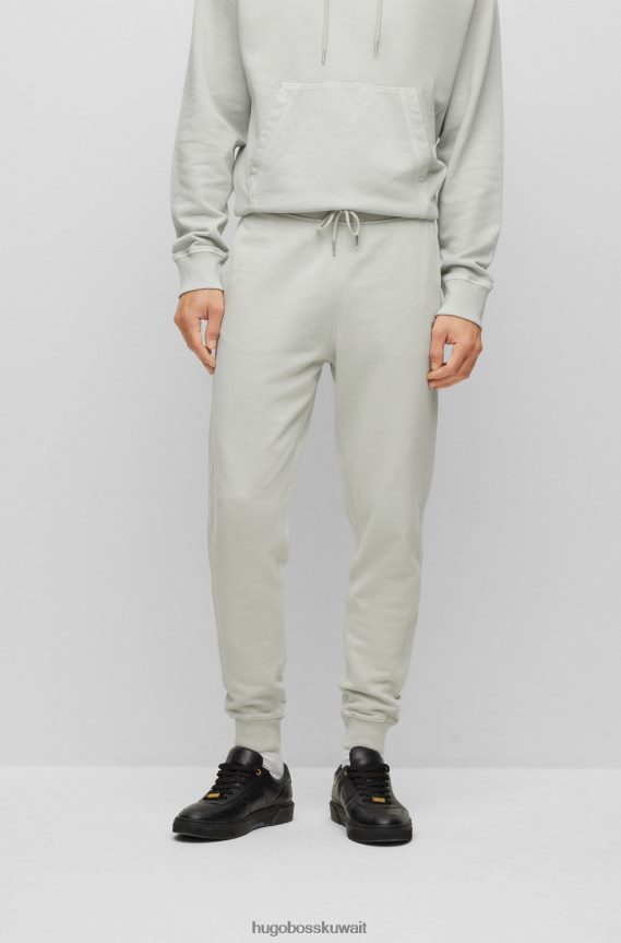 4TFNJN4217 رمادي فاتح Hugo Boss بنطال رياضي من Hugo مصنوع من قطن تيري الفرنسي باللون الرمادي الفاتح