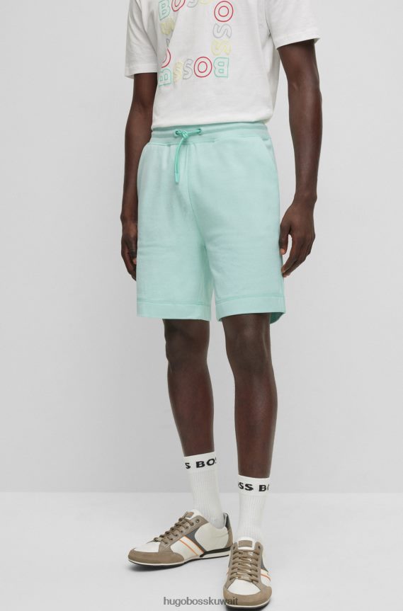 4TFNJN4341 اخضر فاتح Hugo Boss شورت من القطن المطاطي باللون الأخضر الفاتح مع تأثير مولينا © وحبل شد قابل للتعديل