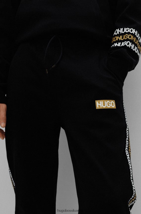 4TFNJN4350 أسود Hugo Boss بدلة رياضية من القطن المتشابك مع تفاصيل الشعار باللون الأسود Hugo