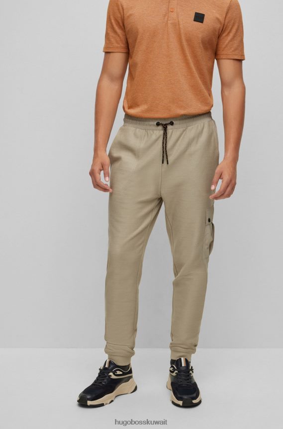 4TFNJN4398 رمادي فاتح Hugo Boss بدلة رياضية من قطن تيري من هوغو باللون الرمادي الفاتح مع شارة الشعار