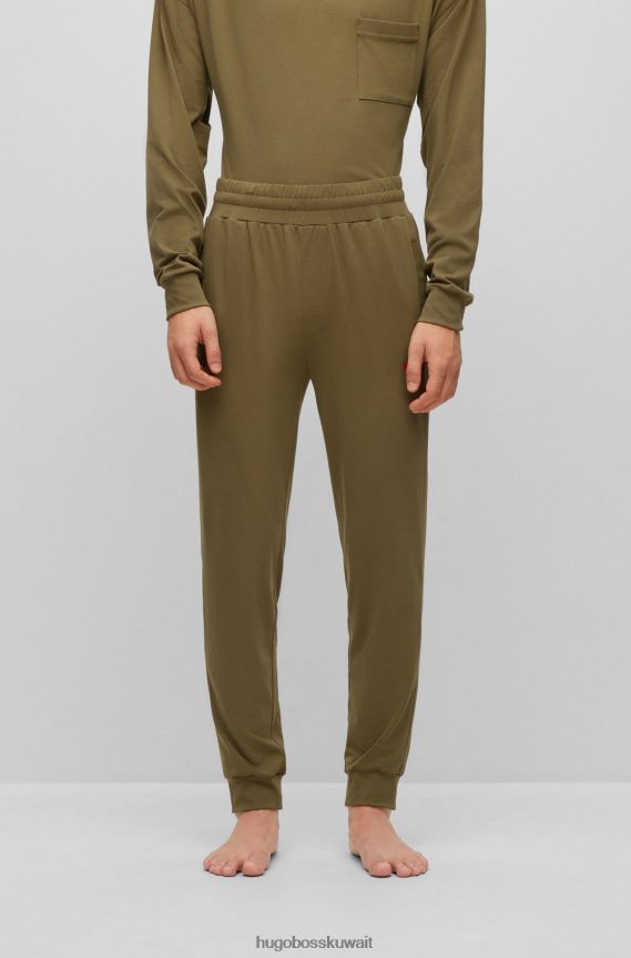 4TFNJN4402 اخضر فاتح Hugo Boss قطعة سفلية رياضية من قطن الجيرسيه المطاطي باللون الأخضر الفاتح مع شعار Hugo باللون الأحمر