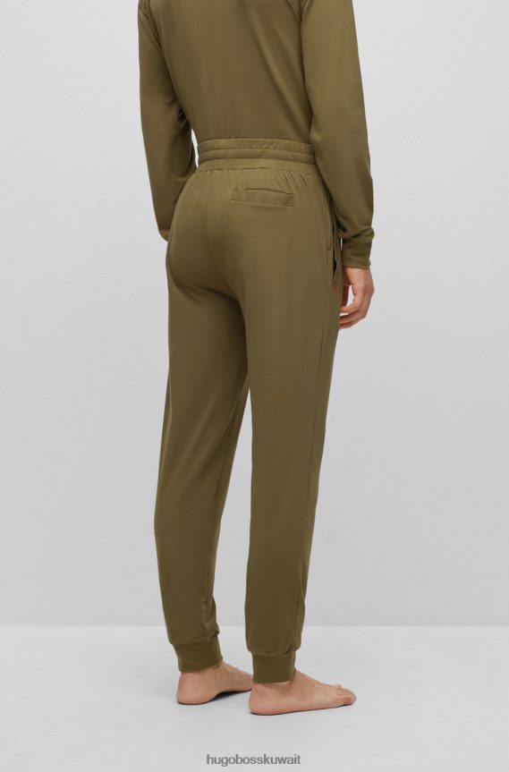 4TFNJN4402 اخضر فاتح Hugo Boss قطعة سفلية رياضية من قطن الجيرسيه المطاطي باللون الأخضر الفاتح مع شعار Hugo باللون الأحمر