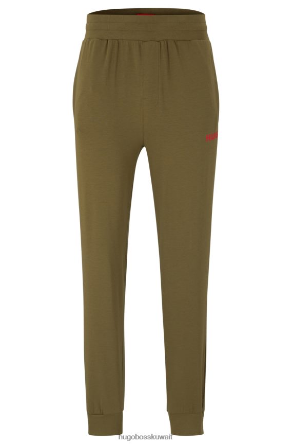 4TFNJN4402 اخضر فاتح Hugo Boss قطعة سفلية رياضية من قطن الجيرسيه المطاطي باللون الأخضر الفاتح مع شعار Hugo باللون الأحمر