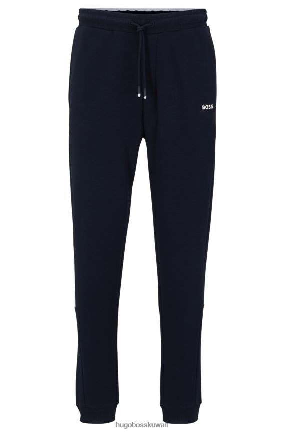 4TFNJN4448 أزرق غامق Hugo Boss بدلة رياضية من مزيج القطن باللون الأزرق الداكن مع طباعة خطوط وشعار Hugo