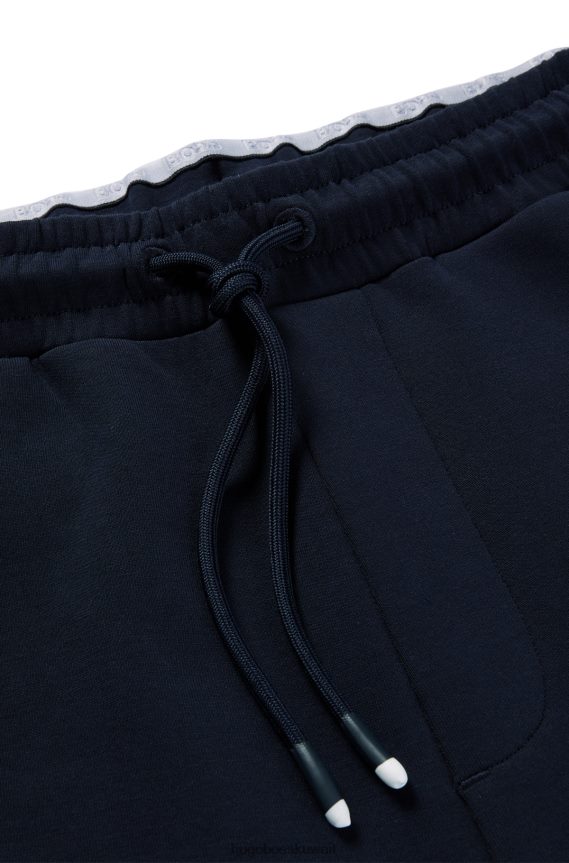 4TFNJN4448 أزرق غامق Hugo Boss بدلة رياضية من مزيج القطن باللون الأزرق الداكن مع طباعة خطوط وشعار Hugo