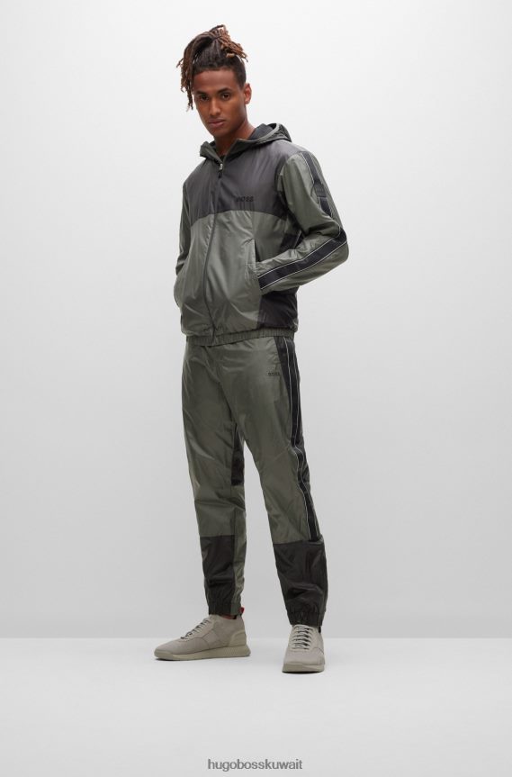 4TFNJN4471 الرمادي الداكن Hugo Boss بدلة رياضية Hugo مقاومة للماء مع تفاصيل الشعار باللون الرمادي الداكن
