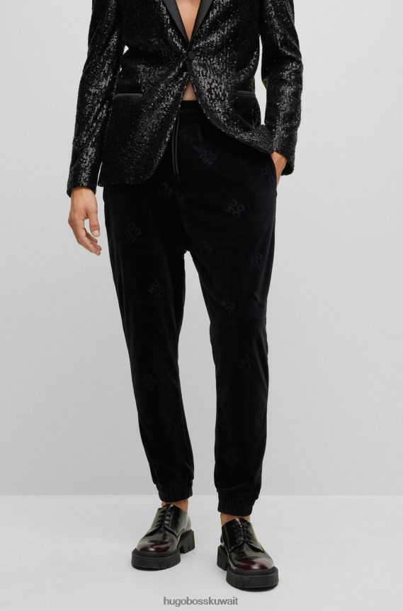 4TFNJN4499 أسود Hugo Boss بنطال رياضي بشعار Hugo مكدس من القطيفة المصنوعة من مزيج القطن