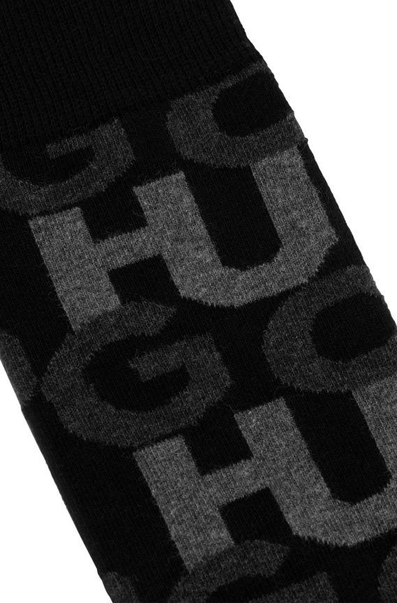 4TFNJN4508 أسود Hugo Boss جوارب بشعار الماركة مصنوعة من مزيج القطن العضوي باللون الأسود