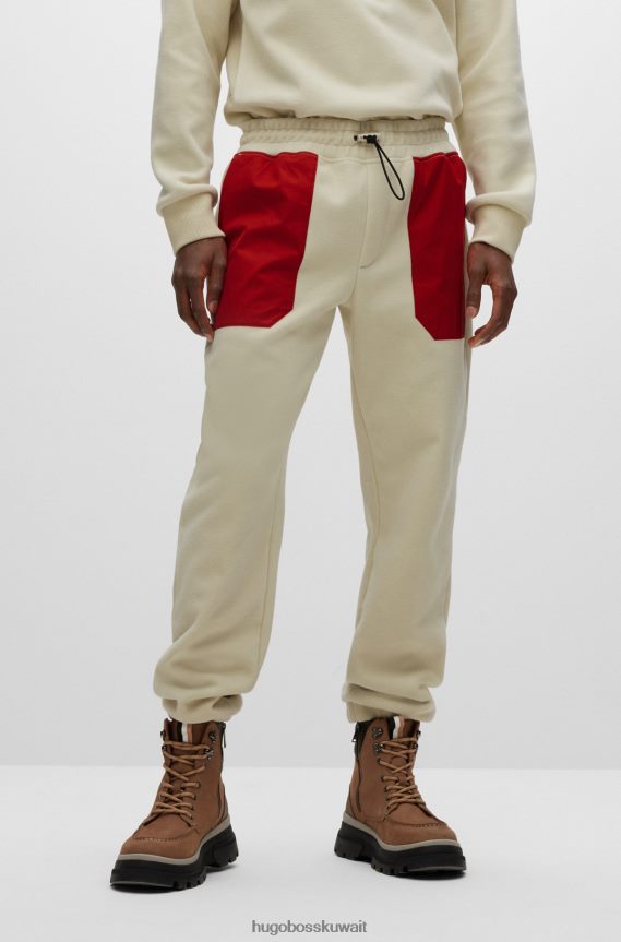 4TFNJN4526 اللون البيج Hugo Boss بدلة رياضية من مزيج القطن من Hugo مع رقعة شعار باللون البيج