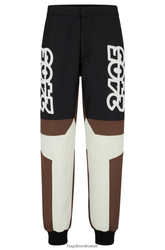 4TFNJN4618 اللون البيج Hugo Boss بنطلون Hugo باللون البيج طارد للماء مع إدراج الشعار