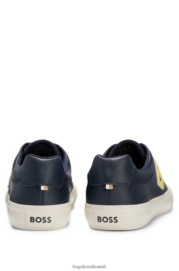 4TFNJN4659 أزرق غامق Hugo Boss حذاء رياضي منخفض الرقبة باللون الأزرق الداكن مع تفاصيل هوغو متباينة على شكل حرف 'b'