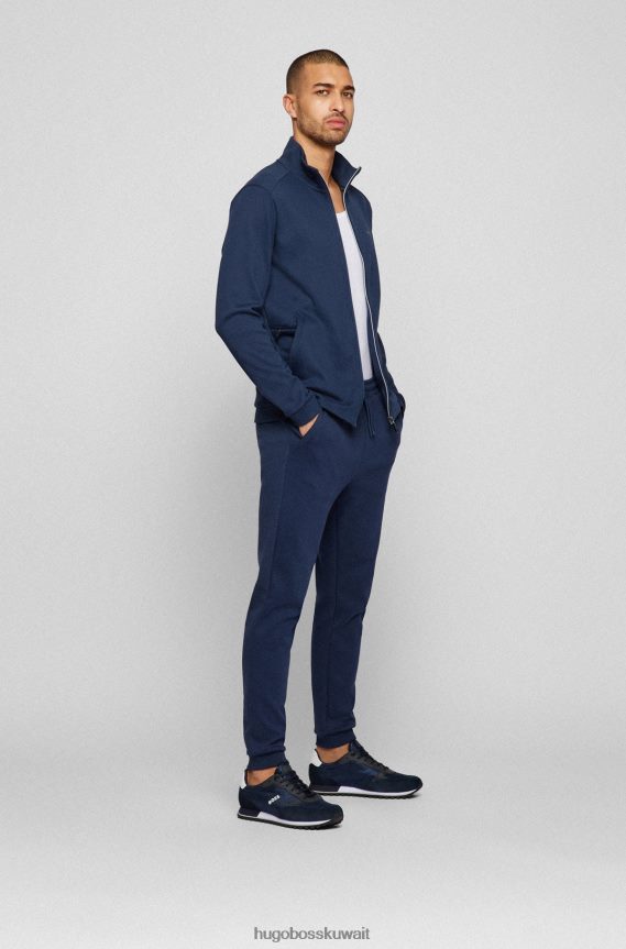 4TFNJN4689 أزرق غامق Hugo Boss حذاء رياضي هوغو باللون الأزرق الداكن مصنوع من مواد مختلطة مع شعار بارز