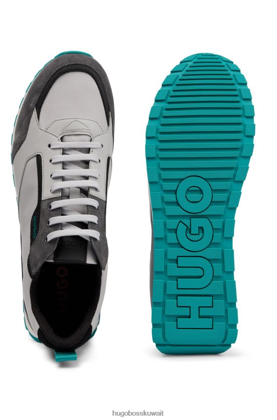 4TFNJN4712 رمادي فاتح Hugo Boss حذاء رياضي مستوحى من الطراز القديم مصنوع من جلد الغزال وشبكة هوغو باللون الرمادي الفاتح