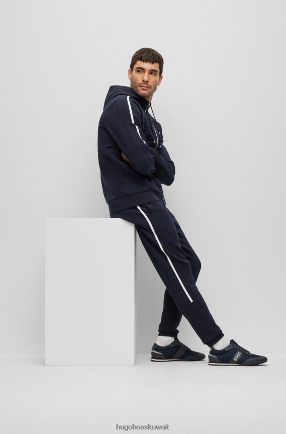 4TFNJN4731 أزرق غامق Hugo Boss حذاء رياضي باللون الأزرق الداكن يحمل علامة هوغو مع ألواح شبكية ومطاطية