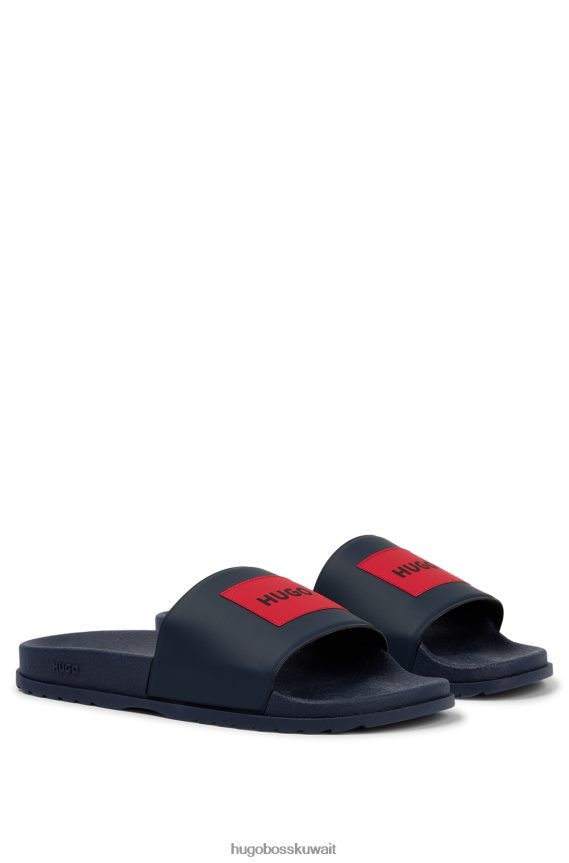 4TFNJN4735 أزرق غامق Hugo Boss شرائح إيطالية الصنع باللون الأزرق الداكن مع رقعة شعار هوغو باللون الأحمر