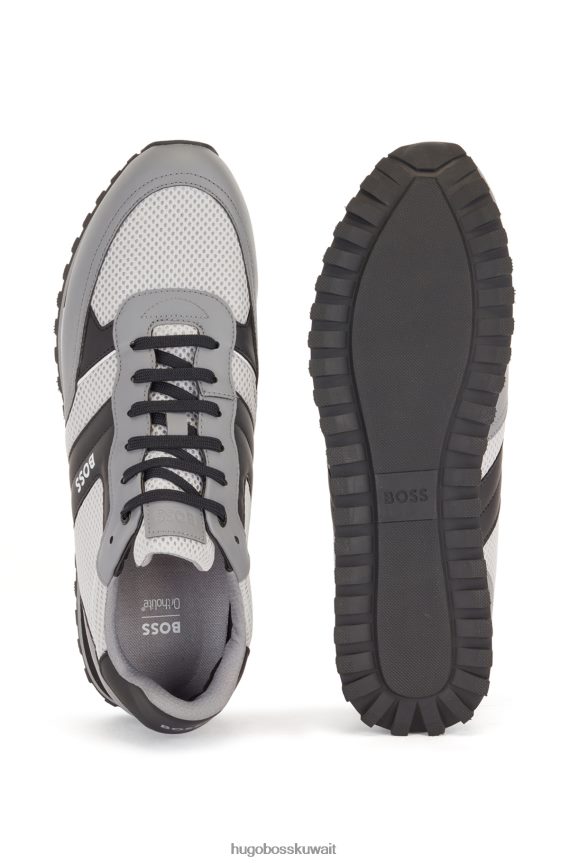 4TFNJN4768 رمادي فاتح Hugo Boss حذاء رياضي باللون الرمادي الفاتح مزين بشعار شبكي مع لمسات مطاطية من هوغو