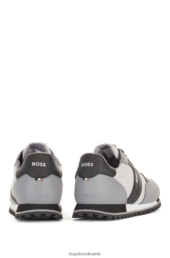 4TFNJN4768 رمادي فاتح Hugo Boss حذاء رياضي باللون الرمادي الفاتح مزين بشعار شبكي مع لمسات مطاطية من هوغو