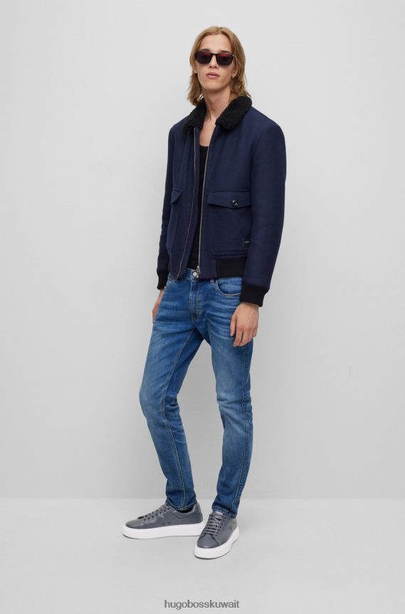 4TFNJN4795 أزرق غامق Hugo Boss حذاء رياضي من مزيج جلد هوغو باللون الأزرق الداكن مع شريط خلفي يحمل العلامة التجارية