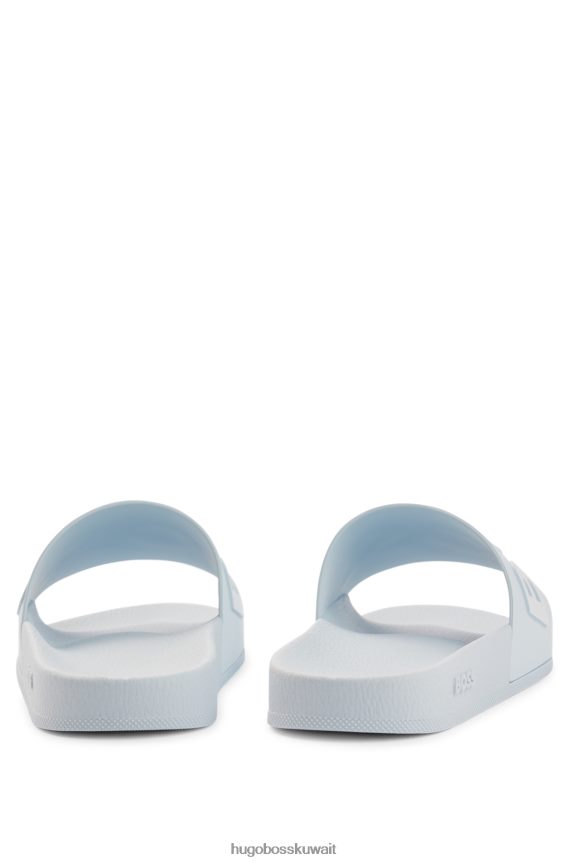 4TFNJN4801 أزرق فاتح Hugo Boss شرائح إيطالية الصنع مع حزام بشعار هوغو باللون الأزرق الفاتح