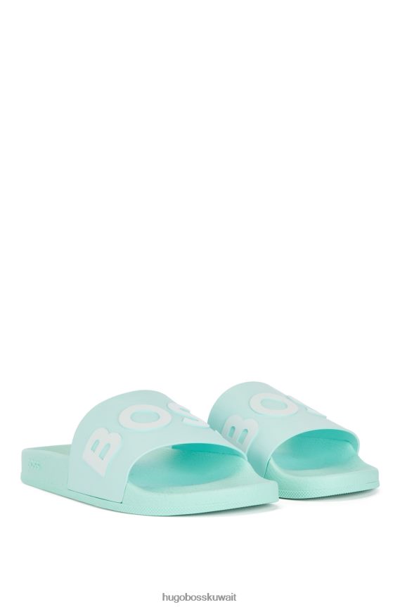 4TFNJN4803 اخضر فاتح Hugo Boss شبشب هوغو إيطالي الصنع باللون الأخضر الفاتح مع حزام يحمل شعارًا متباينًا