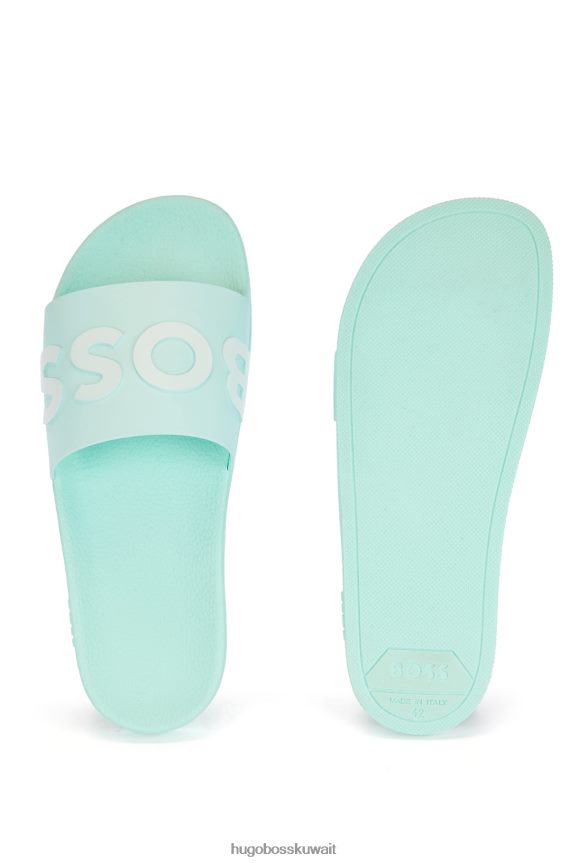 4TFNJN4803 اخضر فاتح Hugo Boss شبشب هوغو إيطالي الصنع باللون الأخضر الفاتح مع حزام يحمل شعارًا متباينًا