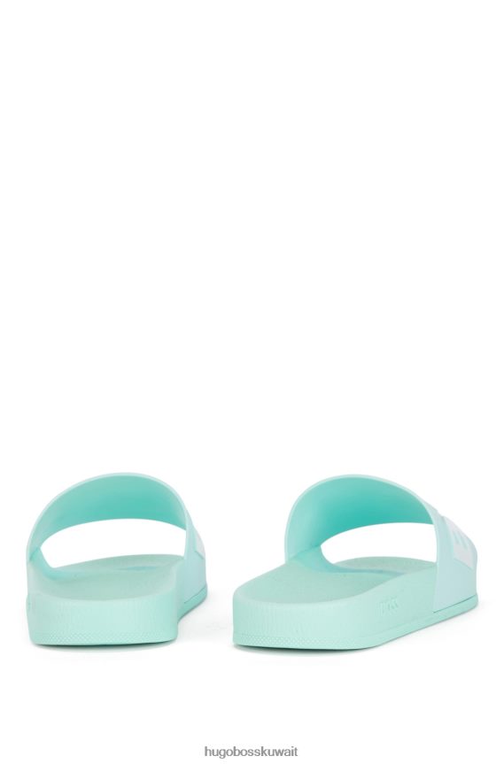 4TFNJN4803 اخضر فاتح Hugo Boss شبشب هوغو إيطالي الصنع باللون الأخضر الفاتح مع حزام يحمل شعارًا متباينًا