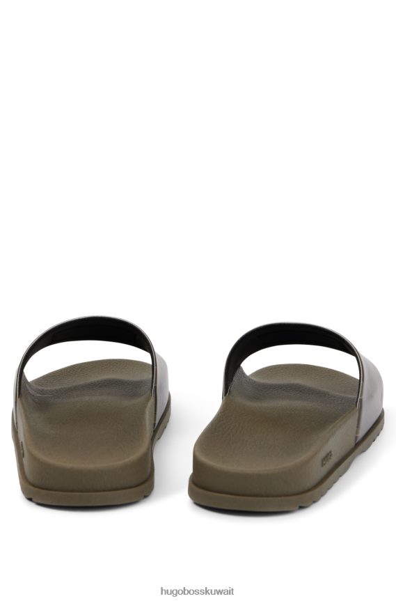 4TFNJN4819 اخضر فاتح Hugo Boss شرائح إيطالية الصنع بنمط مموه وشعار هوغو باللون الأخضر الفاتح