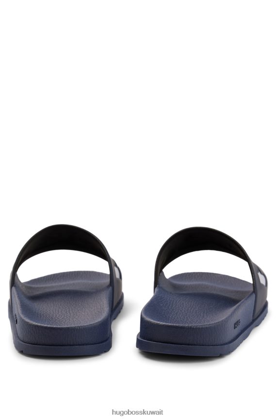 4TFNJN4822 أزرق غامق Hugo Boss شبشب هوغو إيطالي الصنع مع حزام الشعار باللون الأزرق الداكن