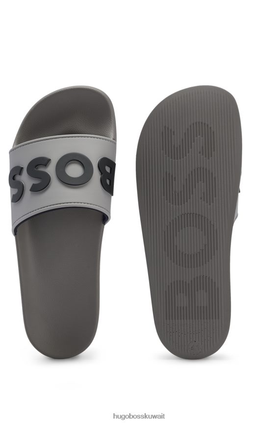 4TFNJN4941 رمادي Hugo Boss شرائح Hugo إيطالية الصنع مع شعار متباين مرتفع باللون الرمادي