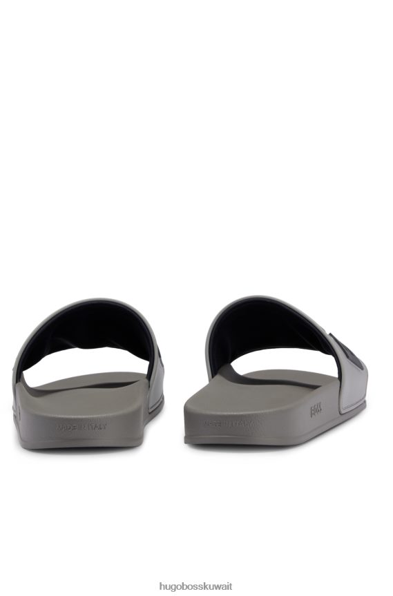 4TFNJN4941 رمادي Hugo Boss شرائح Hugo إيطالية الصنع مع شعار متباين مرتفع باللون الرمادي