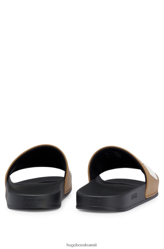 4TFNJN4943 اللون البيج Hugo Boss شرائح بيج إيطالية الصنع مع شعار هوغو متباين مرتفع