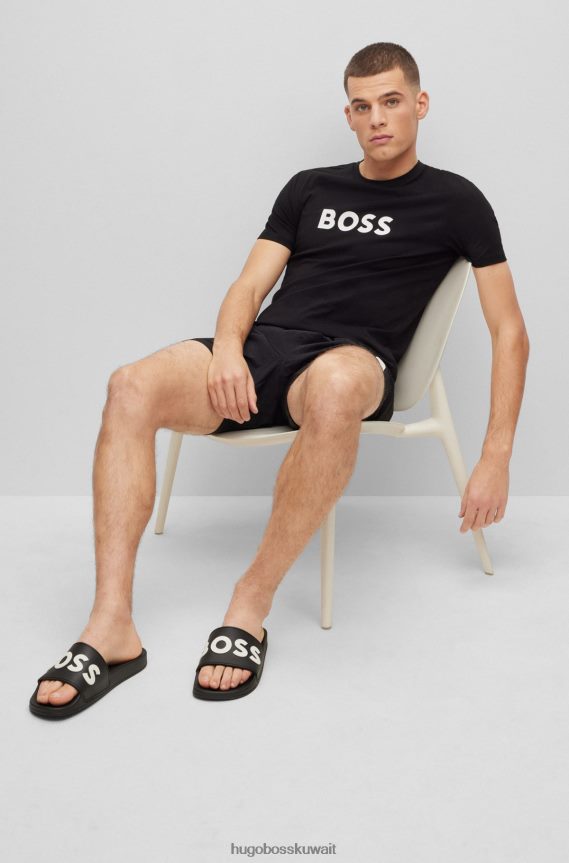 4TFNJN4945 أسود Hugo Boss شرائح هوغو سوداء إيطالية الصنع مع شعار متباين مرتفع