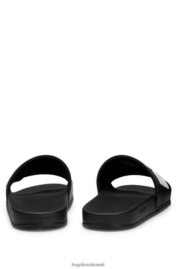 4TFNJN4945 أسود Hugo Boss شرائح هوغو سوداء إيطالية الصنع مع شعار متباين مرتفع