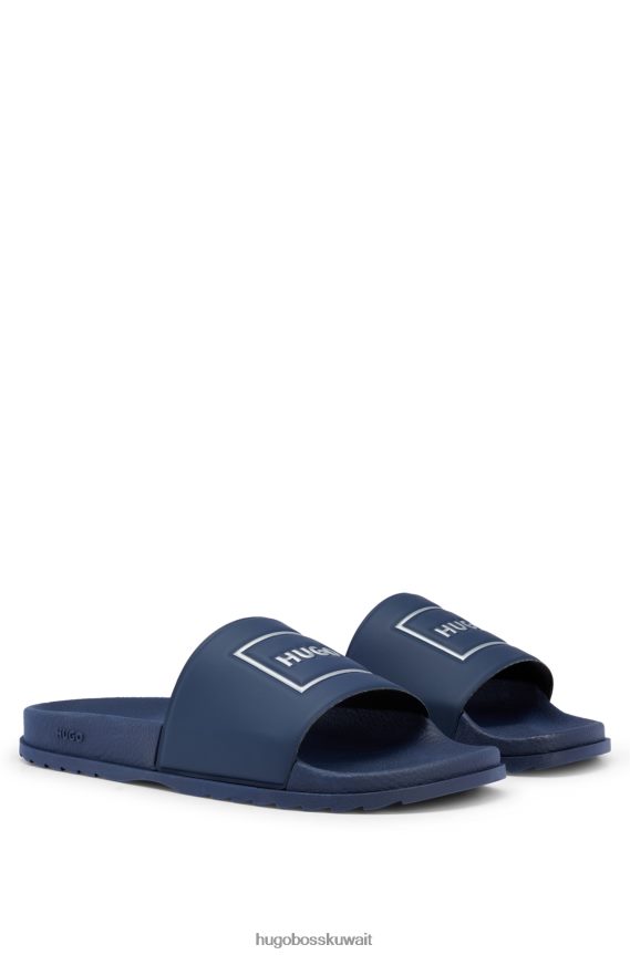 4TFNJN5029 أزرق غامق Hugo Boss شرائح بحزام عريض وشعار Hugo ذو إطار معدني باللون الأزرق الداكن