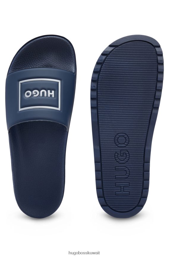 4TFNJN5029 أزرق غامق Hugo Boss شرائح بحزام عريض وشعار Hugo ذو إطار معدني باللون الأزرق الداكن