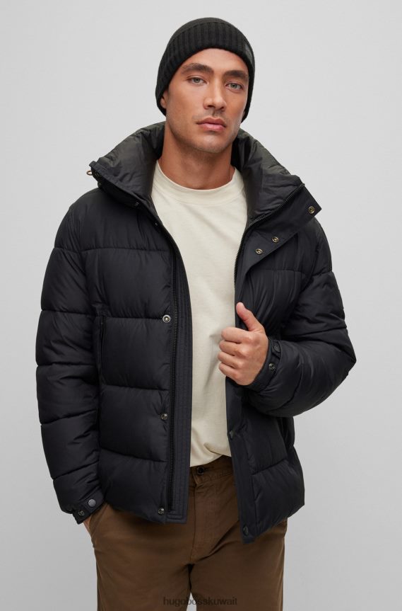 4TFNJN5115 أسود Hugo Boss قبعة صغيرة محبوكة باللون الأسود من هوغو مع شارة شعار منسوجة