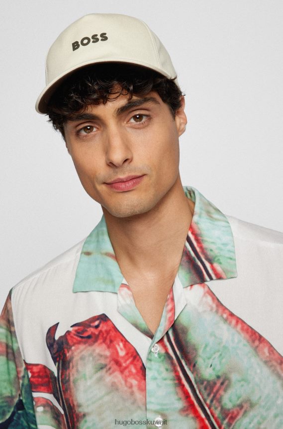 4TFNJN5128 البيج الفاتح Hugo Boss قبعة Hugo من نسيج قطني طويل باللون البيج الفاتح مع الشعار