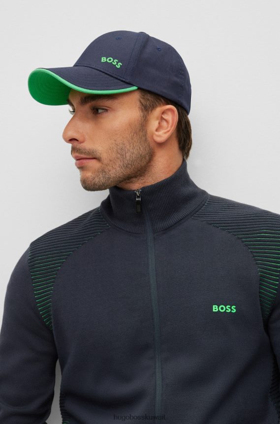 4TFNJN5186 أزرق غامق Hugo Boss قبعة Hugo من نسيج قطني طويل مع شعار متباين ولون أزرق داكن