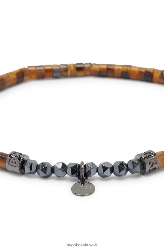 4TFNJN5251 بني Hugo Boss سوار من الهيماتيت البني وعين النمر مزين بتفاصيل الشعار