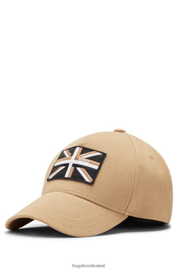4TFNJN5315 اللون البيج Hugo Boss قبعة من نسيج قطني طويل باللون البيج مع شعار Union Jack Hugo