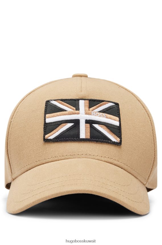 4TFNJN5315 اللون البيج Hugo Boss قبعة من نسيج قطني طويل باللون البيج مع شعار Union Jack Hugo