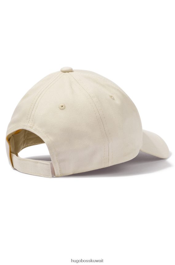 4TFNJN5324 البيج الفاتح Hugo Boss قبعة هوغو باللون البيج الفاتح تحمل شعار الجرافيتي من نسيج قطني مضلع