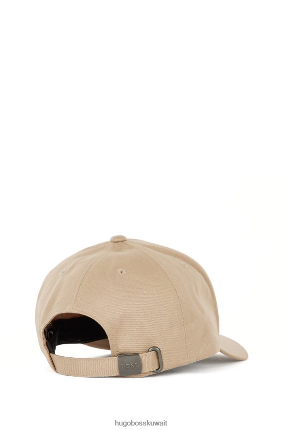 4TFNJN5401 البيج الفاتح Hugo Boss قبعة من نسيج قطني طويل مع شعار عمل فني من Hugo باللون البيج الفاتح