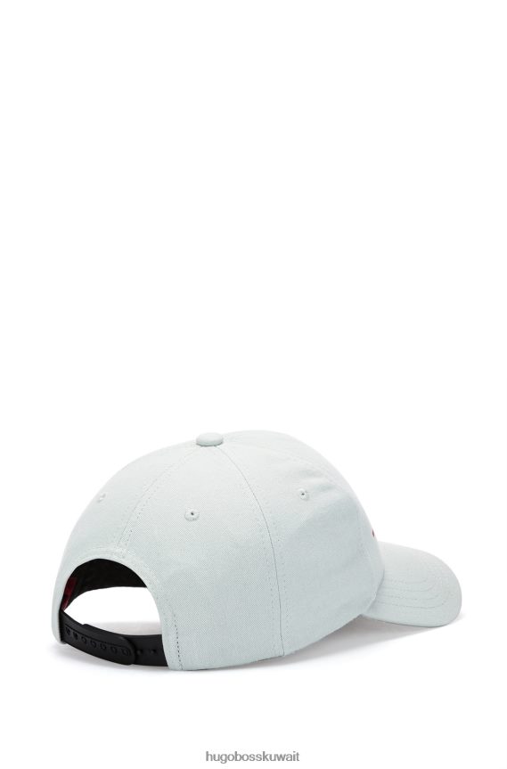 4TFNJN5443 اخضر فاتح Hugo Boss قبعة هوغو قطنية طويلة باللون الأخضر الفاتح مع شعار وشريط أحمر